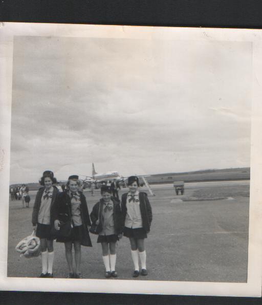 Carol, Elaine, Shona and Linda at the airport in Benbecula, on their way to a Girl Guide camp which took place in Invernesshire, about 1971.