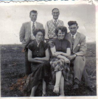 top row, Left unknown, My father bottom row left Clara, middle My mother, right unknown