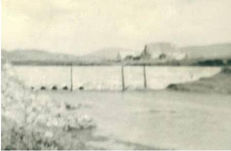 Old Strome Bridge, North Lochboisdale 1960/70 before the new dam was built. I had to cross this on many a windy day on my way to and from Daliburgh School 70/71 and I learnt the best lesson of survival ever - never cross the bridge with an umbrella as I was almost transported bodily, like a parachute which was a very frightening experience when youre only 9yrs old. Inserted by Anne-marie (nee MacKinnon)