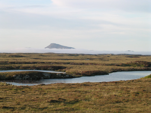 Rueval in the distance, Loch Langavat in foreground, smoke somewhere in the middle.