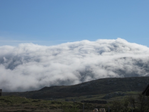 One clear sunny morning late May, coming out and looking North to see Aireneabhal covered in fast moving cloud. It was flowing as fast as a huge surf wave and it just disappeared, coming no further.
