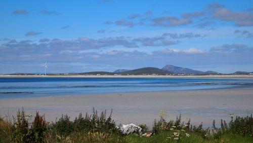 View from Balgarva over to Benbecula.You can see the lionacleit windturbine to the left of the pic.