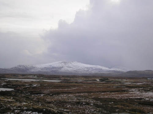 snow in mountains a rare view at South Uist