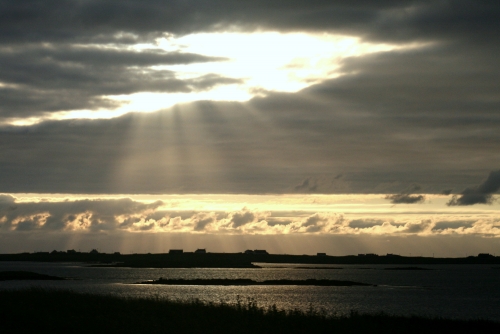 Sun appearing through a gap in the clouds on the way from the ferry in Lochmaddy