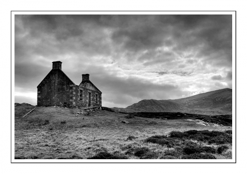 Taken on a walk at Loch Carnan, initially the clouds made everything rather flat, but as we approached this cottage everything changed! 