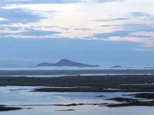 Looking northward - the new Island of Eaval appears - floating through a rolling mist bank