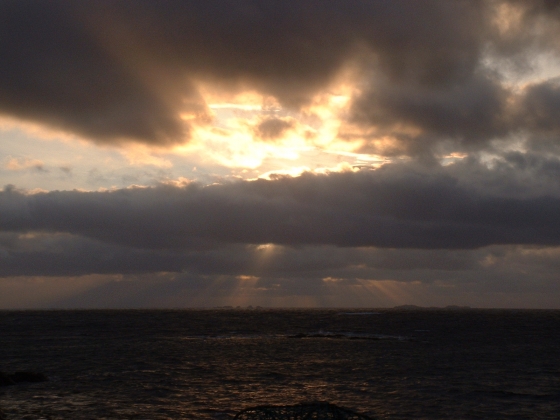 Taken in 2005 from Hougharry, looking towards St Kilda (I think) and archipelago of neighbouring islands. The sunset was rather dramatic.