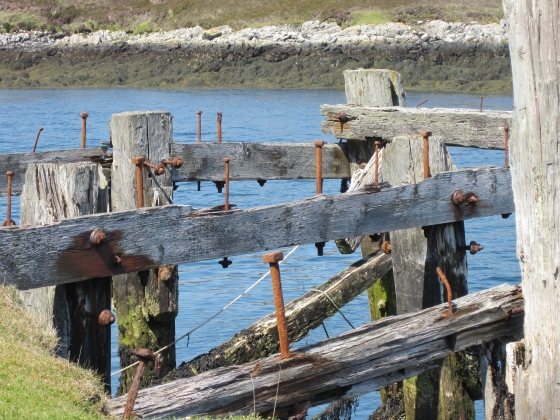 Old wood and bolts at low tide.Pier at Loch Skipport - May 2012